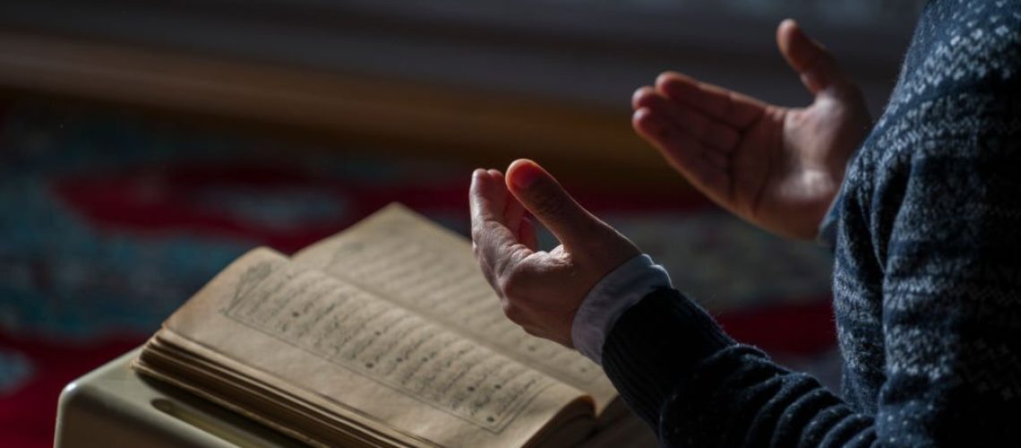 Muslims prayer namaz in mosque sunlight from window